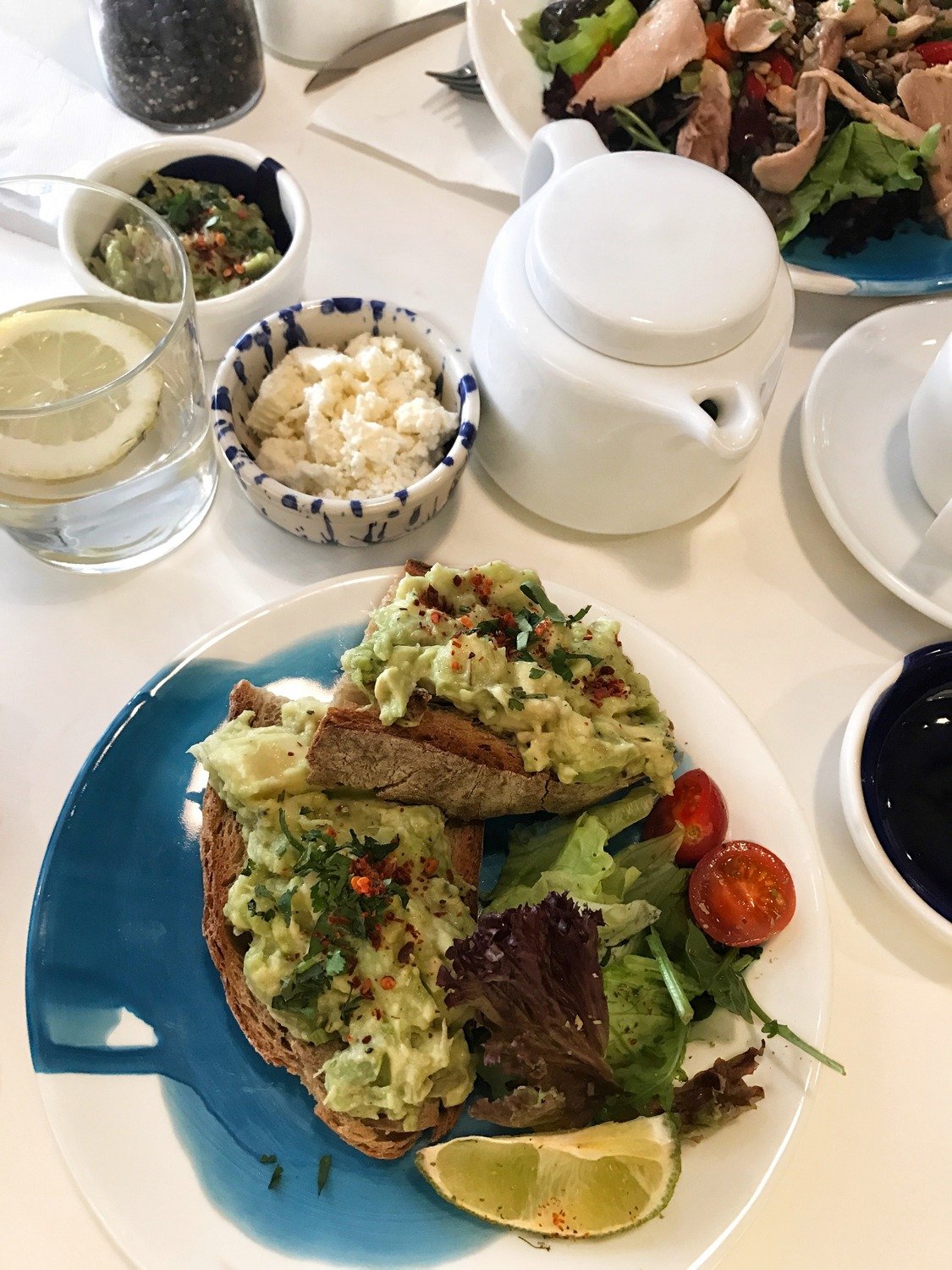Smashed avocado on sourdough bread at The Mill Lisbon