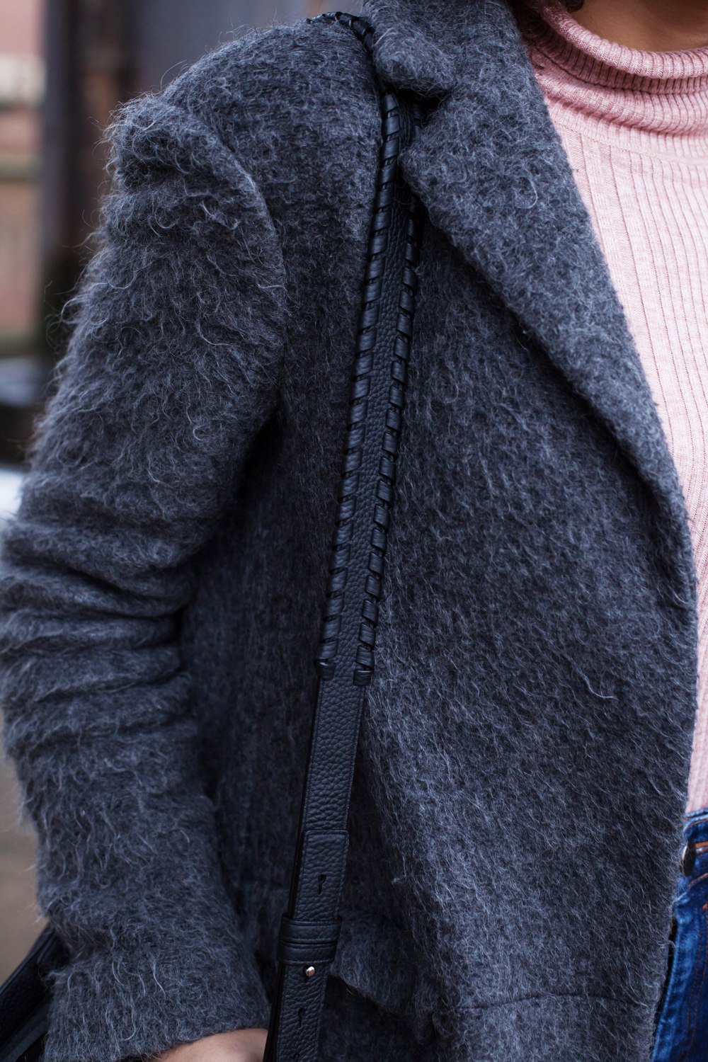 Grey coat close up and all saints bag strap